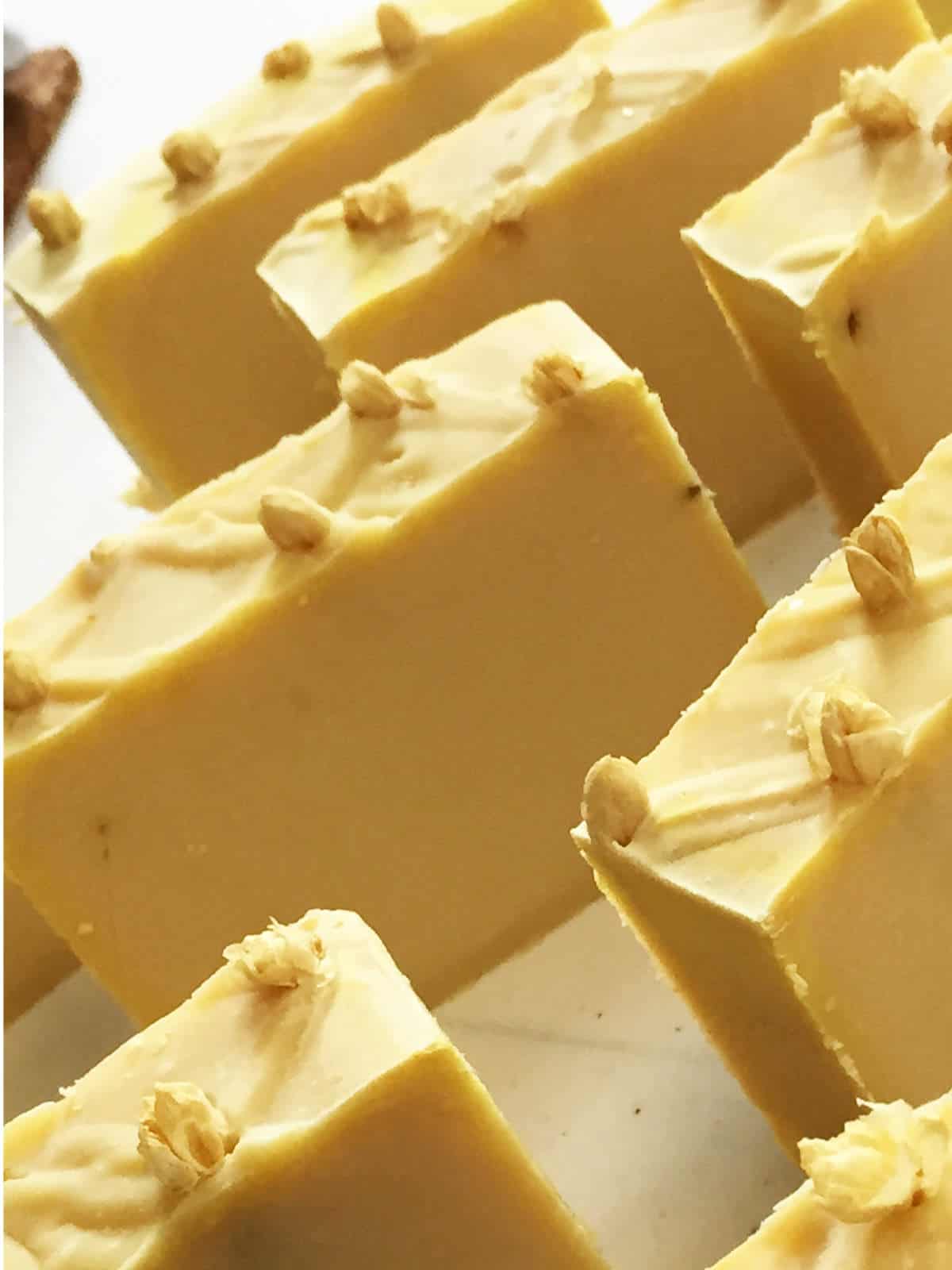 cut bars of yellow clay cold process soap.